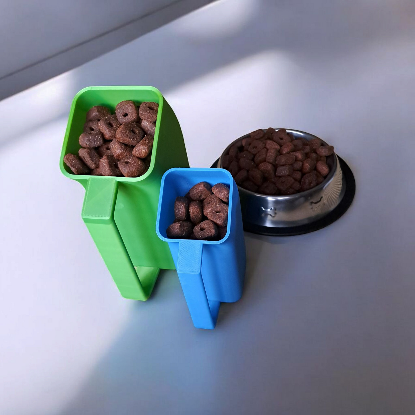 Doseur à croquettes – accessoire pratique pour chiens et chats